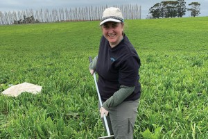 Dr Kara Allen collecting topsoil samples